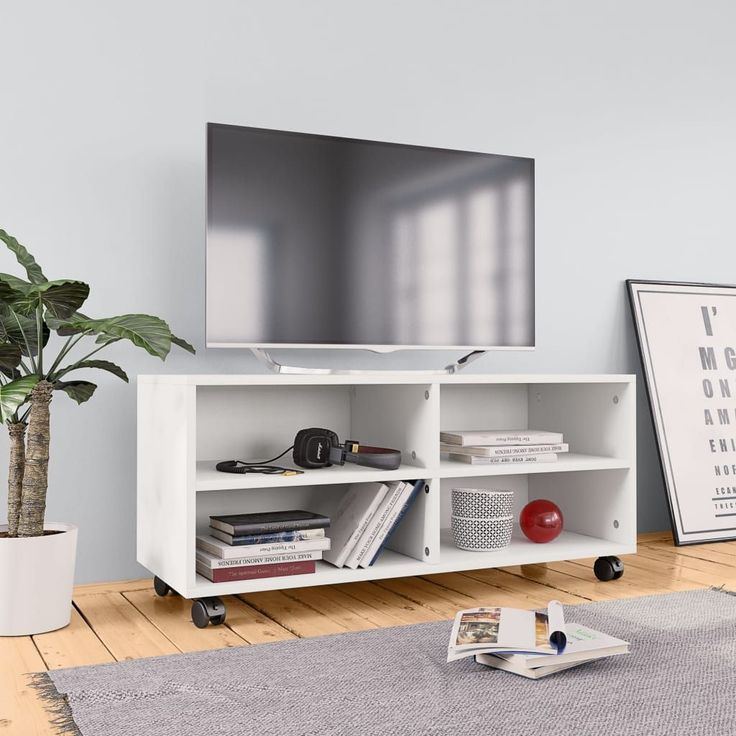 Tv-taso rullapyörillä valkoinen 90x35x35 cm lastulevy_1