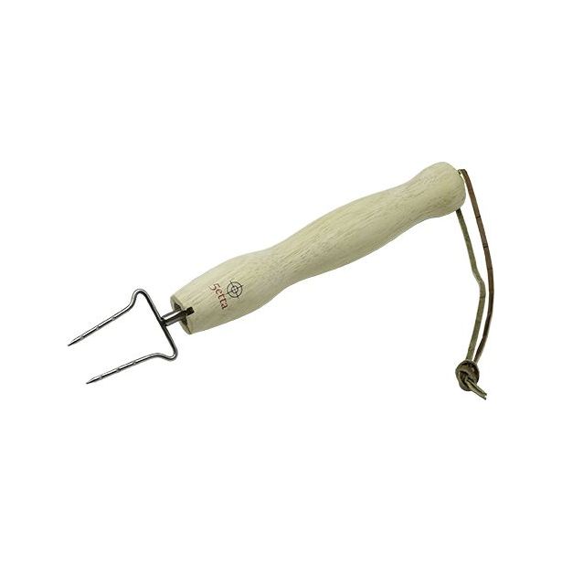 Teleskooppimakkaratikku 5etta sisältää kotelon