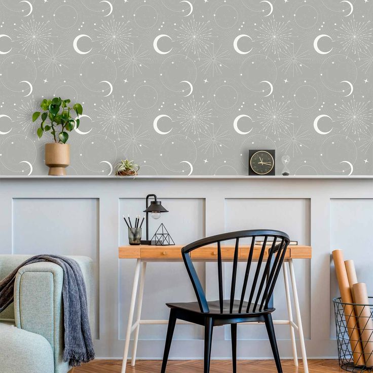 Tapetti - Cosmic Fireworks - Elegant pattern with moons and stars on a gray background.