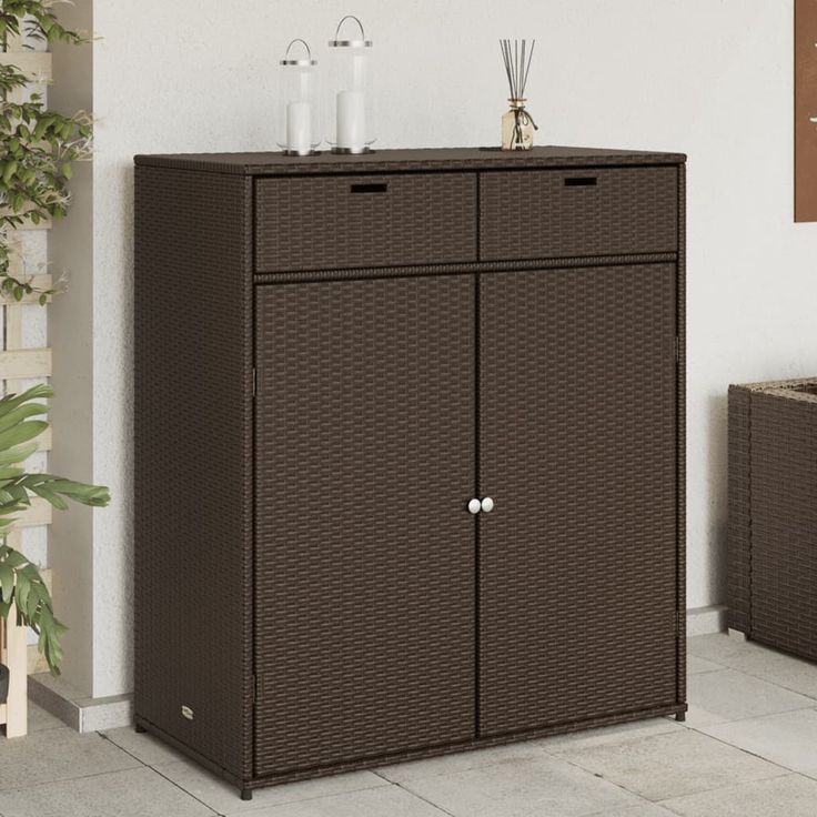 Puutarhan säilytyskaappi ruskea 105x55x113 cm polyrottinki