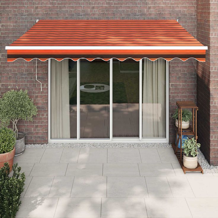 Sisäänkelattava markiisi oranssi/ruskea 3,5x2,5 m kangas/alumiini